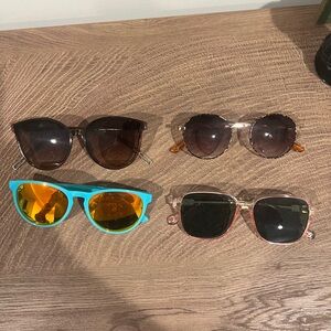 4 pairs of womens sunglasses